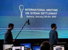 Reporters walk in the media center set for Syria peace talks, in Astana, Kazakhstan, January 23, 2017. PHOTO BY REUTERS/Mukhtar Kholdorbekov