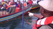 Rescue workers are seen at the scene where a ferry overturned in Lake Victoria, Tanzania September 21, 2018, in this still image taken from video. PHOTO BY REUTERS/Reuters TV