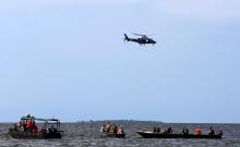 Rescue and recovery missions search for the bodies of dead passengers after a cruise boat capsized in Lake Victoria off Mukono district, Uganda, November 25, 2018. PHOTO BY REUTERS/James Aken