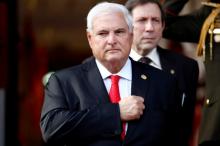 Panama's President Ricardo Martinelli listens to the national anthem before his meeting with Venezuela's President Nicolas Maduro at the Miraflores Palace in Caracas, Venezuela on July 8, 2013. PHOTO BY REUTERS/Carlos Garcia Rawlins