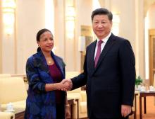 US National Security Adviser Susan Rice (L) shakes hands with Chinese President Xi Jinping during their meeting at the Great Hall of the People in Beijing, China, 25 July 2016. PHOTO BY REUTERS/How Hwee Young