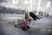 Riot police use a water cannon to disperse LGBT rights activist before a Gay Pride Parade in central Istanbul, Turkey, June 28, 2015. PHOTO BY REUTERS/Kemal Aslan
