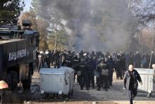 Bulgarian riot police are seen inside a refugee center during clashes in the town of Harmanli, Bulgaria, November 24, 2016. PHOTO BY REUTERS/Tihmoir Petkov