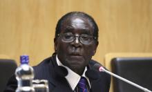 Zimbabwe's President and Chairperson of African Union (AU) Robert Mugabe addresses a news conference during the closing ceremony of the 24th Ordinary session of the Assembly of Heads of State and Government of the African Union at the African Union headquarters in Ethiopia's capital Addis Ababa, January 31, 2015. REUTERS/Tiksa Negeri