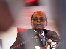 President Robert Mugabe waits to address mourners gathered for the funeral of former cabinet minister and ZANU-PF member Cephas Msipa in Harare, Zimbabwe, October 22, 2016. PHOTO BY REUTERS/Philimon Bulawayo