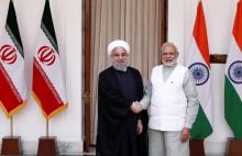 Iranian President Hassan Rouhani shakes hands with India's Prime Minister Narendra Modi (R) during a photo opportunity ahead of their meeting at Hyderabad House in New Delhi, India, February 17, 2018. PHOTO BY REUTERS/Adnan Abidi