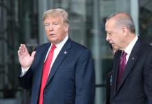 U.S. President Donald Trump talks to Turkey's President Recep Tayyip Erdogan at NATO headquarters in Brussels, Belgium, July 11, 2018. PHOTO BY REUTERS/Tatyana Zenkovich/Pool 