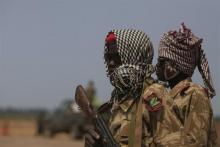 Sudan People's Liberation Army (SPLA) soldiers guard the airport in Malakal