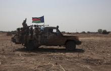 SPLA soldiers drive to the frontline at Mathiang from their military base in Bor, South Sudan, January 26, 2014. PHOTO BY REUTERS/George Philipas
