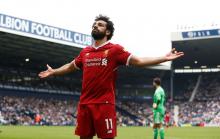 Liverpool's Mohamed Salah celebrates scoring their second goal. PHOTO BY REUTERS/Andrew Yates