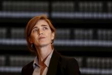 U.S. Ambassador to United Nations Samantha Power looks at pictures of Jews killed in the Holocaust during a visit to the Hall of Names at Yad Vashem's Holocaust History Museum in Jerusalem, February 14, 2016. PHOTO BY REUTERS/Amir Cohen