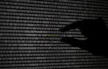 A hand is silhouetted in front of a computer screen in this picture illustration taken in Berlin, May 21, 2013. PHOTO BY REUTERS/Pawel Kopczynski