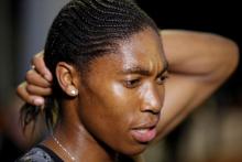 South African athlete Caster Semenya speaks with journalists after she raced during a 2,000 metres for the first time after her ban due to elevated testosterone levels, at a small meeting in Montreuil, near Paris. PHOTO BY REUTERS/Philippe Wojazer