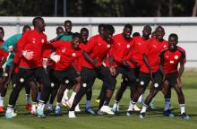 Senegal Players dance during a training session. PHOTO BY REUTERS/David Gray