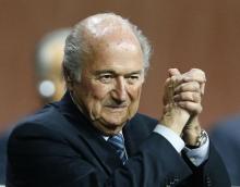 FIFA President Sepp Blatter gestures after he was re-elected at the 65th FIFA Congress in Zurich, Switzerland, May 29, 2015. PHOTO BY REUTERS/Arnd Wiegmann