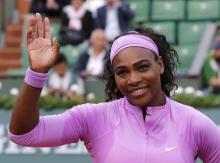 Serena Williams of the U.S. celebrates after beating Andrea Hlavackova of the Czech Republic during the women's singles match at the French Open tennis tournament at the Roland Garros stadium in Paris, France, May 26, 2015. PHOTO BY REUTERS/Pascal Rossignol
