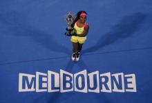 Serena Williams poses with her trophy after defeating Maria Sharapova of Russia in their women's singles final match at the Australian Open 2015 tennis tournament in Melbourne, January 31, 2015. PHOTO BY REUTERS/Carlos Barria