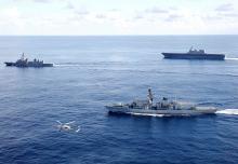 British frigate HMS Argyll (front), Japanese destroyer Inazuma (L) and Japanese helicopter carrier Kaga take part in a joint naval drill in the Indian Ocean, September 26, 2018. PHOTO BY REUTERS/Kim Kyung-Hoon