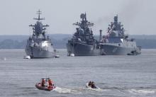 (L-R) Russian navy corvette Steregushchy, destroyer Nastoichivy and frigate Admiral Gorshkov are anchored in a bay of the Russian fleet base in Baltiysk in Kaliningrad region, Russia, July 19, 2015. PHOTO BY REUTERS/Maxim Shemetov