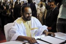 Sidi Brahim Ould Sidati of the Coordination of Movements for Azawad signs a peace agreement in Bamako, Mali, June 20, 2015. PHOTO BY REUTERS/Stringer