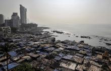 A view of a slum is seen along a seashore in Mumbai, India, November 28, 2019. PHOTO BY REUTERS/Prashant Waydande