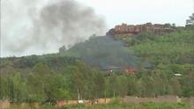 Flames rise following an attack where gunmen stormed Le Campement Kangaba resort in Dougourakoro, to the east of the capital Bamako, Mali in this still frame taken from video June 18, 2017. PHOTO BY REUTERS
