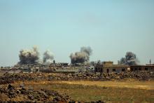 Smoke rises from al-Harak town, as seen from Deraa countryside, Syria, June 25, 2018. PHOTO BY REUTERS/Alaa al-Faqir