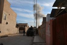 Smoke rises from clashes during battle with Islamic State militants in Mosul, Iraq, December 29, 2016. PHOTO BY REUTERS/Stringer