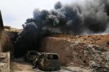 Smoke rises from an emergency service point after an airstrike at the rebel-held village of Maar Zita in Idlib province, Syria, April 27, 2017. PHOTO BY REUTERS/Ammar Abdullah