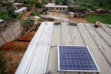 A solar panel is pictured on the roof of Jean-Noel Kouame's house, on the outer limits of the main city Abidjan's vast urban sprawl, Ivory Coast, December 18, 2017. PHOTO BY REUTERS/Thierry Gouegnon