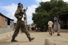 A Somali soldier patrols a street following a suicide car bomb and gun attack on Tuesday that killed 11 people in Afgoye, Somalia, October 19, 2016. PHOTO BY REUTERS/Feisal Omar