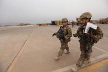 U.S army soldiers walk at the Qayyarah West Airfield, Iraq, March 1, 2017. PHOTO BY REUTERS/Azad Lashkari