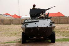 Soldiers stand guard on a armoured tank outside an internal displaced persons (IDP) camp during the official flag-off of food and relief materials distribution for the internal displaced persons in Nigerian city of Maiduguri, June 8, 2017. PHOTO BY REUTERS/Akintunde Akinleye