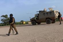 Soldiers guard positions near the Naaba Koom military base in Ouagadougou, Burkina Faso. PHOTO BY REUTERS/Arnaud Brunet