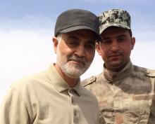 Iranian Revolutionary Guard Commander Qassem Soleimani (L) stands at the frontline during offensive operations against Islamic State militants in the town of Tal Ksaiba in Salahuddin province, March 8, 2015. HPTO BY REUTERS/Stringer
