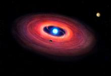 An artist's rendering shows a star called a white dwarf with a planet (upper right) and material in orbit around the star. PHOTO BY REUTERS/Mark Garlick/UCLA
