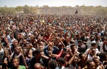 Supporters of Bekele Gerba, secretary general of the Oromo Federalist Congress (OFC), chant slogans to celebrate Gerba's release from prison, in Adama, Oromia Region, Ethiopia, February 14, 2018. PHOTO BY REUTERS/Tiksa Negeri