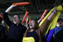 Supporters of Colombian right-wing presidential candidate Ivan Duque celebrate after he won a spot in a June runoff with leftist Gustavo Petro after Colombians voted for president in Bogota, Colombia, May 27, 2018. PHOTO BY REUTERS/Carlos Garcia Rawlins