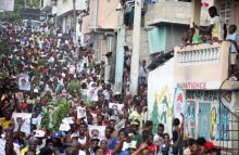 Supporters of Fanmi Lavalas political party march to claim the victory of their candidate in the streets of Port-au-Prince, Haiti, November 27, 2016. PHOTO BY REUTERS/Jeanty Junior Augustin