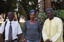 Survivors of Yahya Jammeh's AIDS treatment programme Lamin Ceesay, Fatou Jatta and Ousman Sowe (left to right) pose for a photo in Banjul, Gambia, January 18, 2018. PHOTO by Thomson Reuters Foundation/Nellie Peyton