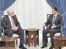 Syria's President Bashar al-Assad (R) meets Russian deputy Foreign Minister Sergei Ryabkov in Damascus