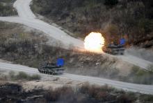 South Korean Army K1A1 tanks fire live rounds during a U.S.-South Korea joint live-fire military exercise at a training field, near the demilitarized zone, separating the two Koreas in Pocheon, South Korea, April 21, 2017. PHOTO BY REUTERS/Kim Hong-Ji