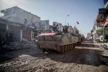 Turkish tanks are pictured in the northern Syrian town of Kobani as they return from a military operation inside Syria, February 22, 2015. PHOTO BY REUTERS/Mursel Coban/Depo Photos