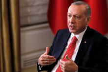 Turkish President Tayyip Erdogan sits during an interview with Reuters in Manhattan, New York, U.S., September 25, 2018. PHOTO BY REUTERS/Andrew Kelly