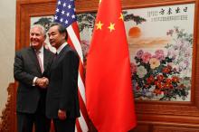 U.S. Secretary of State Rex Tillerson (L) shakes hands with Chinese Foreign Minister Wang Yi before a meeting at the Great Hall of the People in Beijing, China, September 30, 2017. PHOTO BY REUTERS/Andy Wong