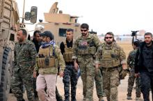 Syrian Democratic Forces and U.S. troops are seen during a patrol near Turkish border in Hasakah, Syria, November 4, 2018. PHOTO BY REUTERS/Rodi Said