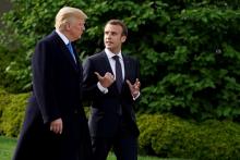 U.S. President Donald Trump and French President Emmanuel Macron walk from the Oval Office of the White House in Washington, U.S., April 23, 2018. PHOTO BY REUTERS/Joshua Roberts