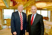 Israeli Prime Minister Benjamin Netanyahu (R) stands next to Donald Trump during their meeting in New York, September 25, 2016. PHOTO BY REUTERS/Kobi Gideon