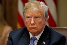 U.S. President Donald Trump listens during a cabinet meeting at the White House in Washington, U.S., July 18, 2018. PHOTO BY REUTERS/Leah Millis