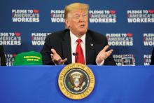 U.S. President Donald Trump participates in a roundtable discussion on workforce development at Northeast Iowa Community College in Peosta, Iowa, U.S., July 26, 2018. PHOTO BY REUTERS/Joshua Roberts